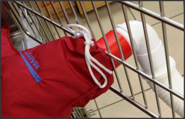 Installed adapter with warming hose inserted and cloth blanket tied in place inside the cage.