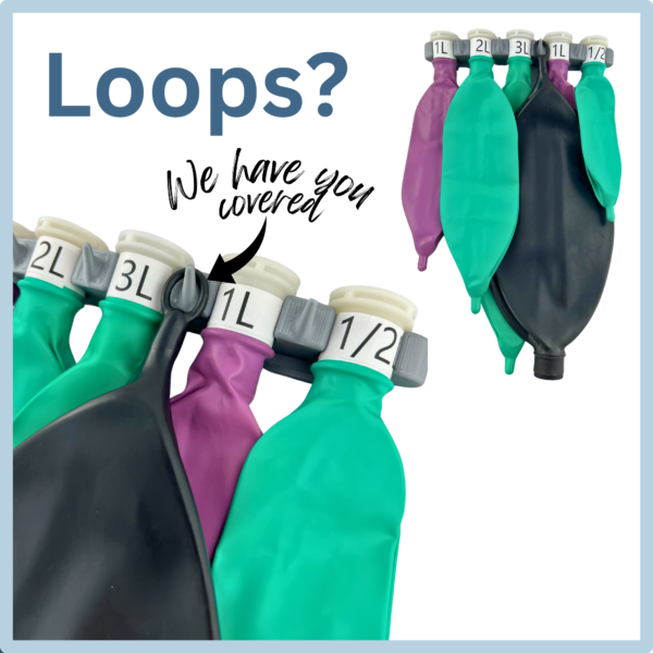 Close up of the tail loop on an anesthesia bag looped over one of the hooks on the rack.